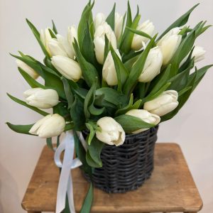 Sweet Tulip Basket finished with a bow